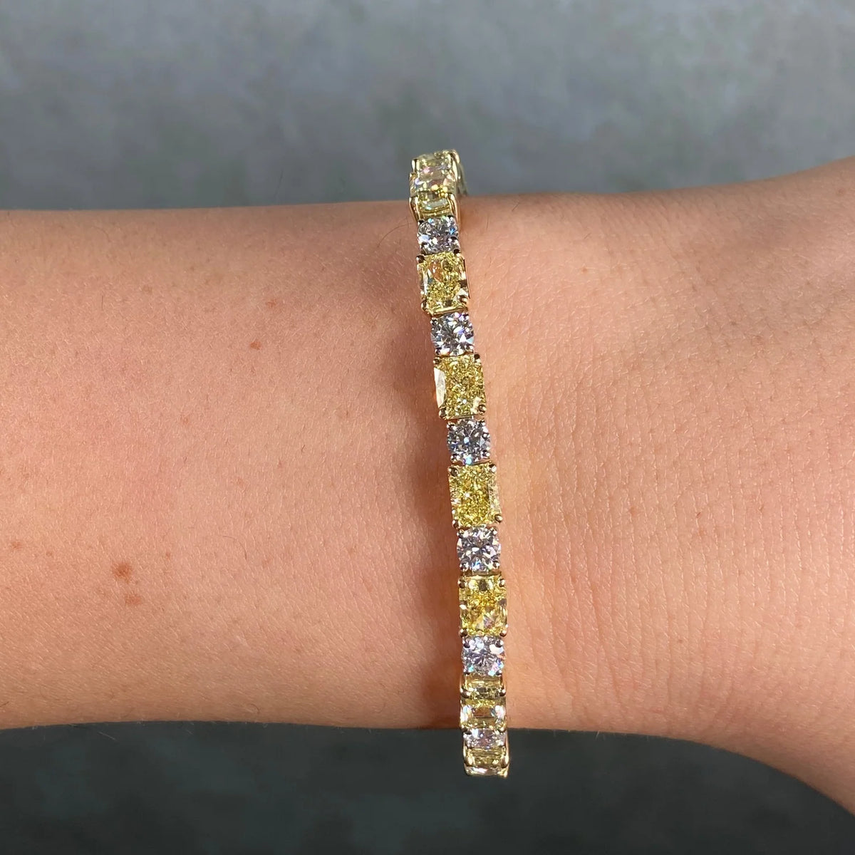13.88ctw Fancy Yellow Radiant Diamond & White Round Diamond Alternating Bracelet