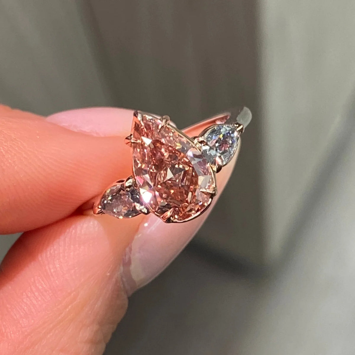2.22ct Fancy Deep Brown-Pink Pear Diamond VS2 GIA Ring with Blue Diamond Sides