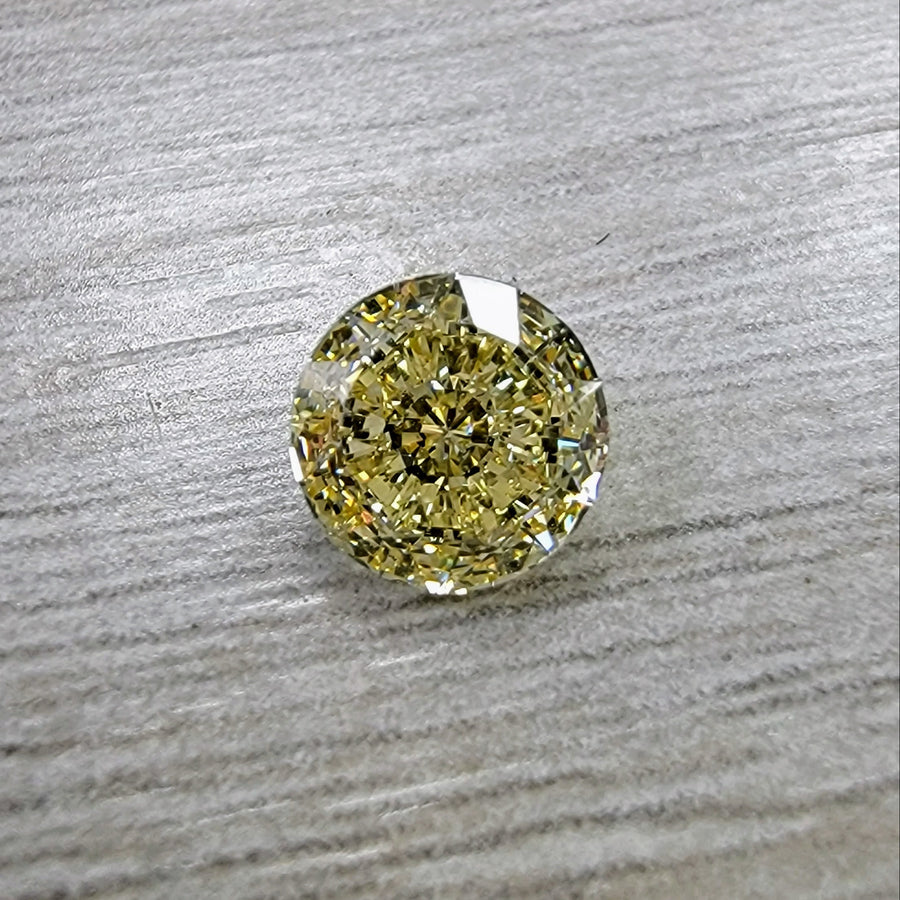 1.08ct Fancy Light Yellow Round IF Diamond GIA
