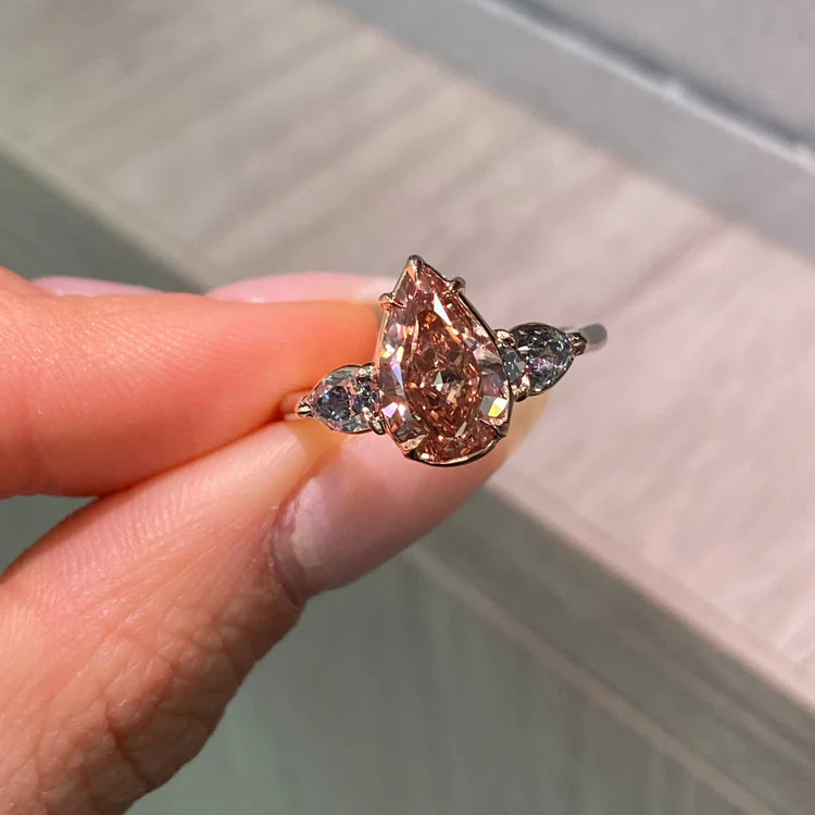2.22ct Fancy Deep Brown-Pink Pear Diamond VS2 GIA Ring with Blue Diamond Sides
