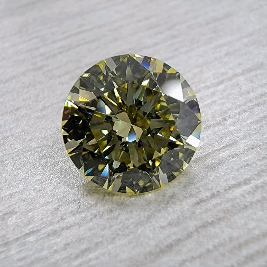 1.06ct Light Yellow Round Diamond VVS2 GIA
