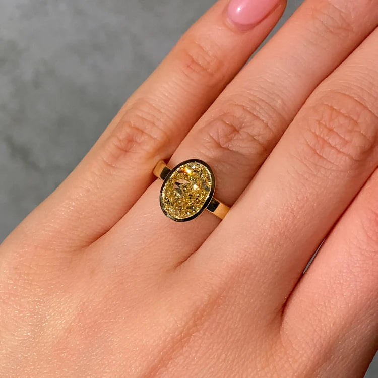 3.65ct Fancy Light Yellow Oval Diamond Bezel Ring VS1 GIA