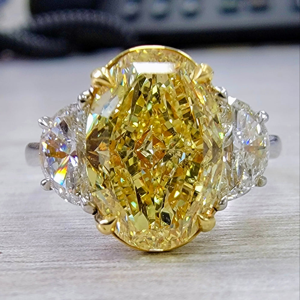 3.01ct Fancy Intense Yellow Oval Diamond Ring SI2 GIA