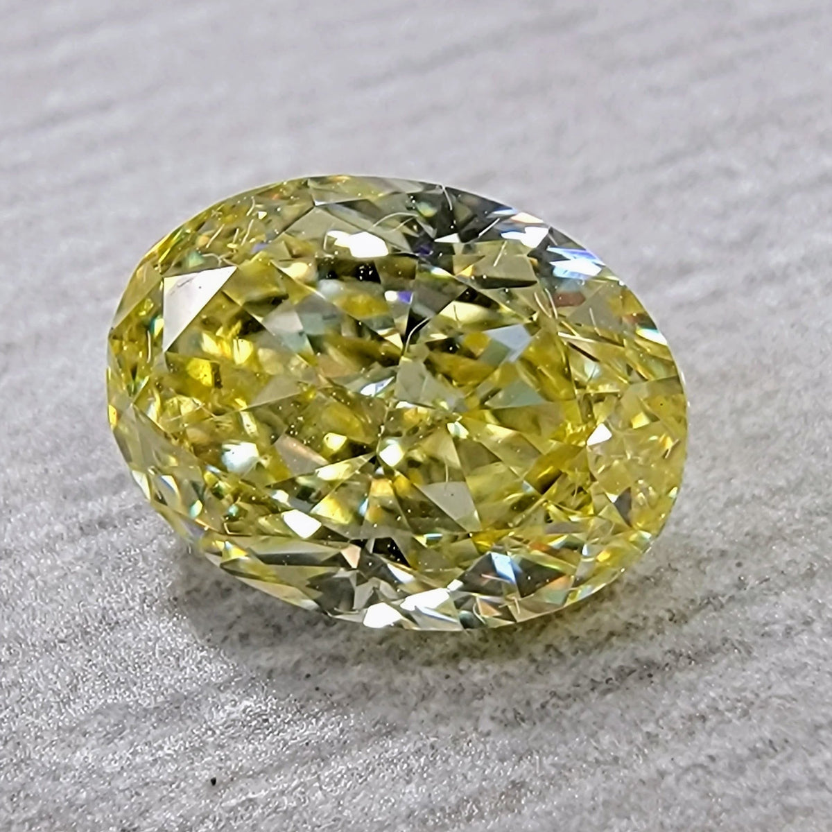 1.06ct Fancy Intense Yellow Oval Diamond VS1 GIA