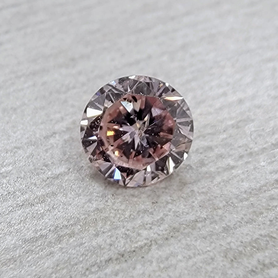 0.23ct Fancy Orangy Pink Round Diamond GIA