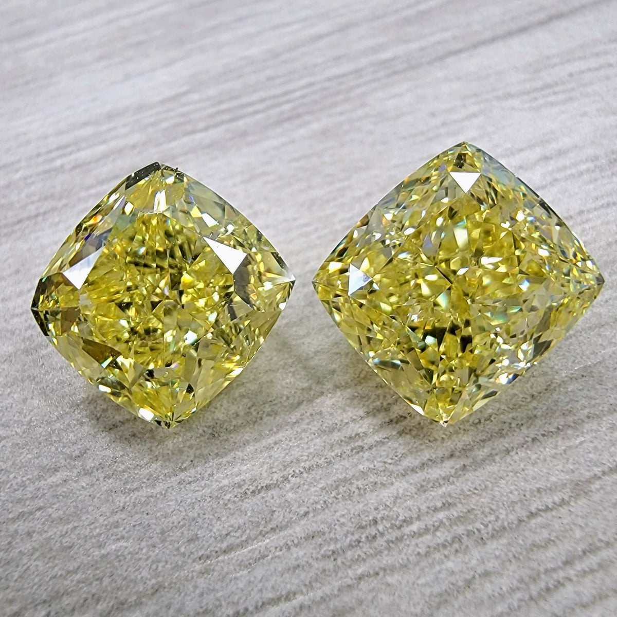 3.50ct & 3.28ct Fancy Intense Yellow Cushion Diamonds VS GIA