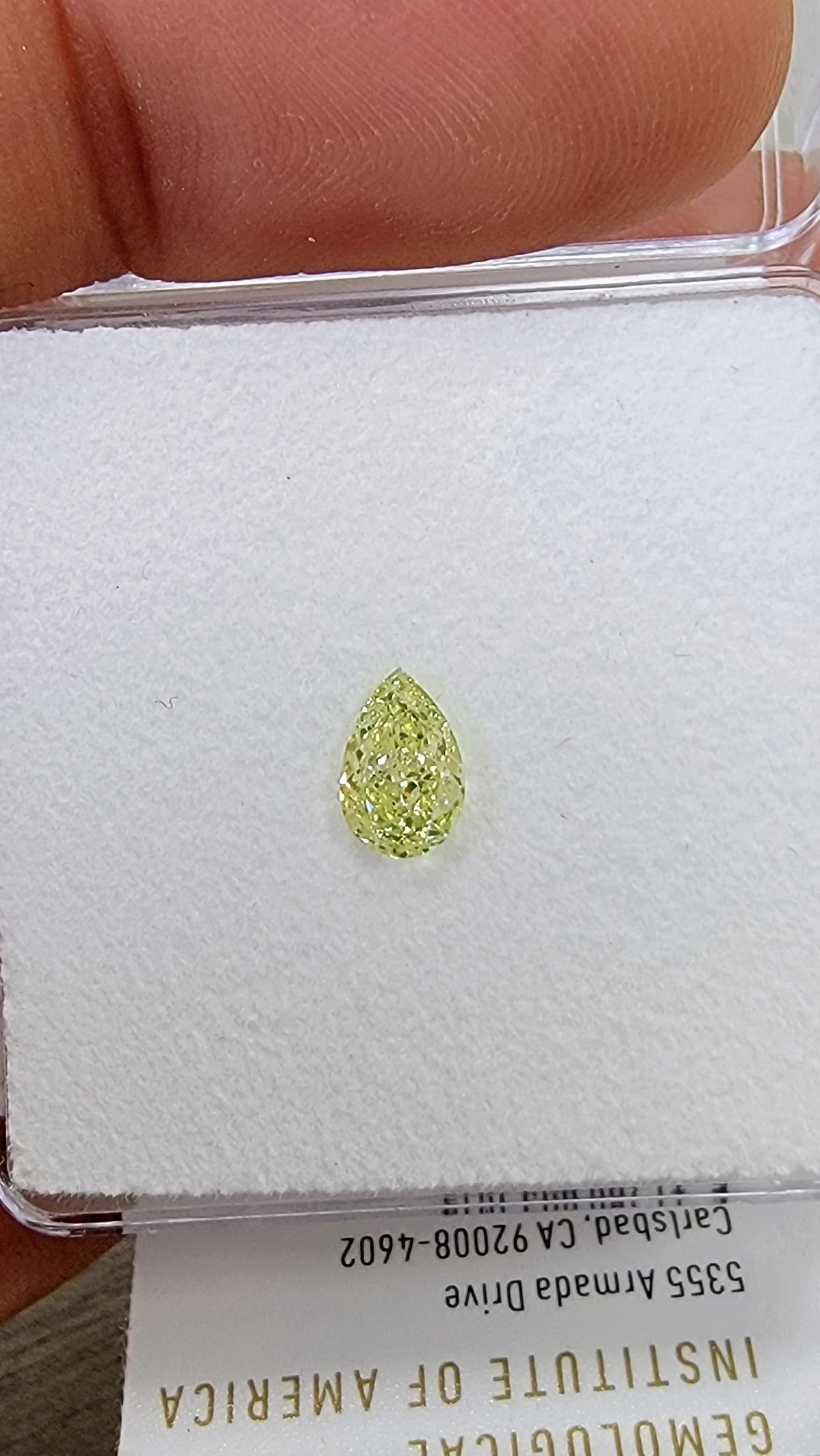 0.75ct Fancy Light Green Yellow NEON Pear Diamond VS2 GIA