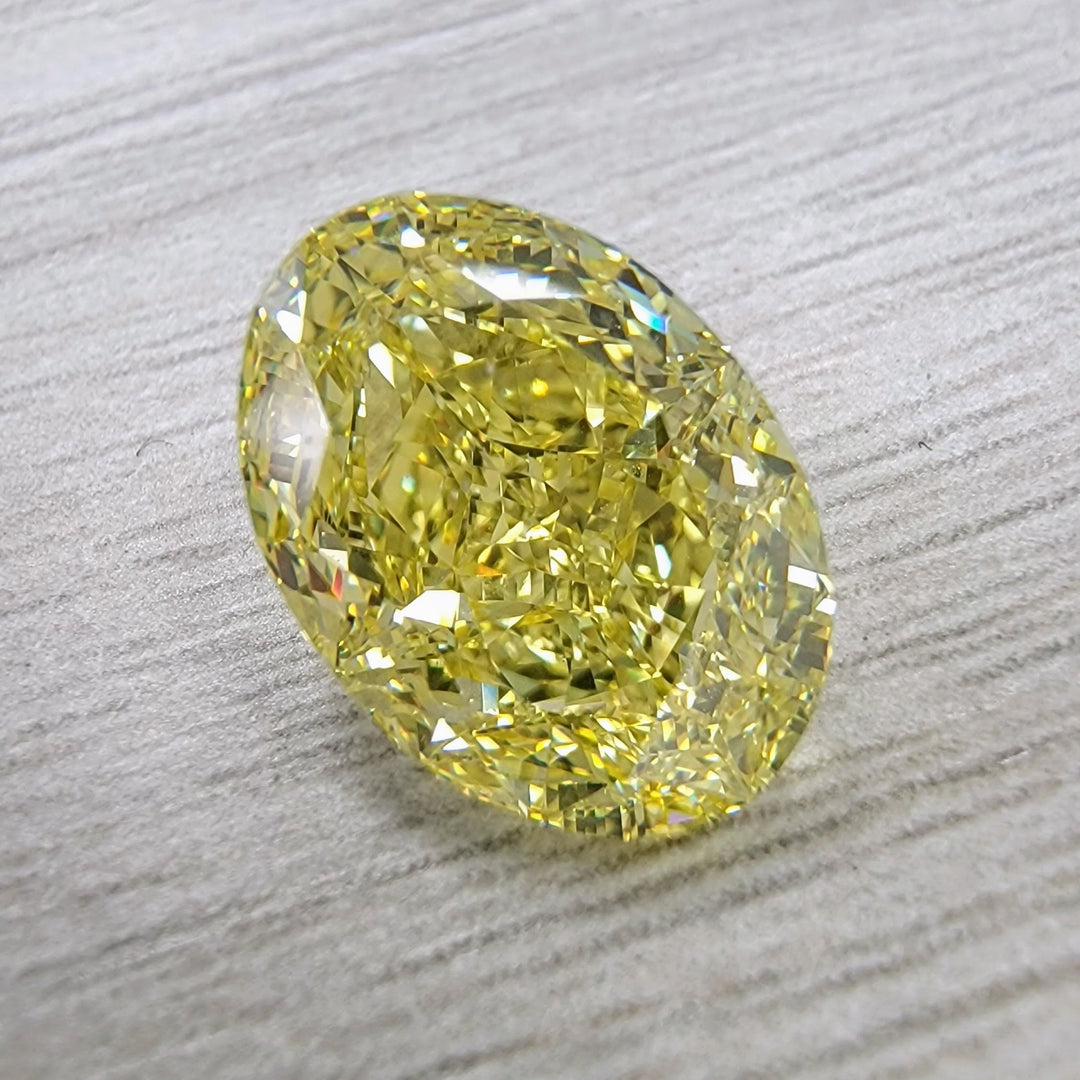 5.01ct Fancy Intense Yellow Oval Diamond GIA VS2