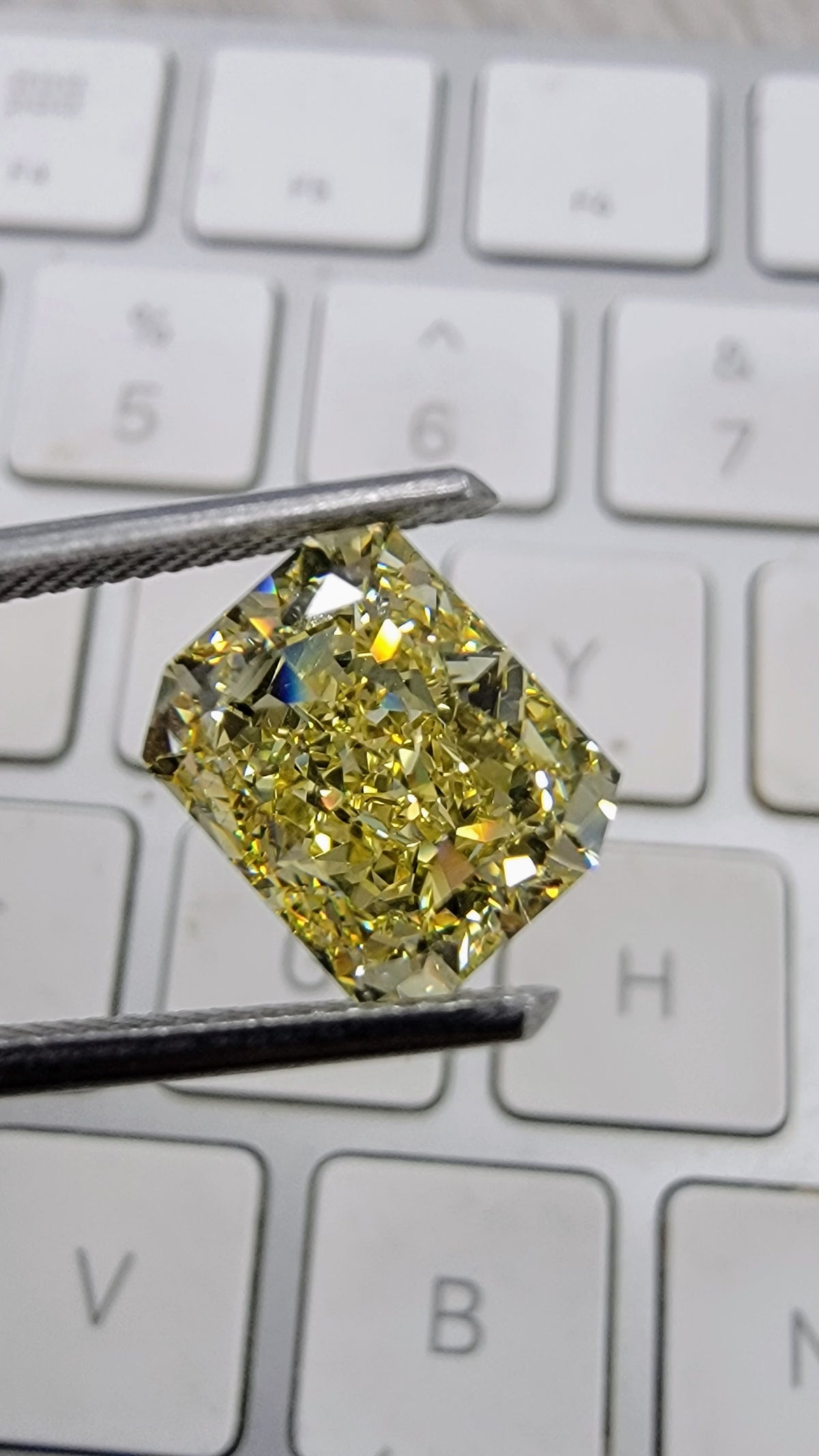 4.05ct Fancy Intense Yellow Elongated Radiant Diamond Ring VVS1 GIA
