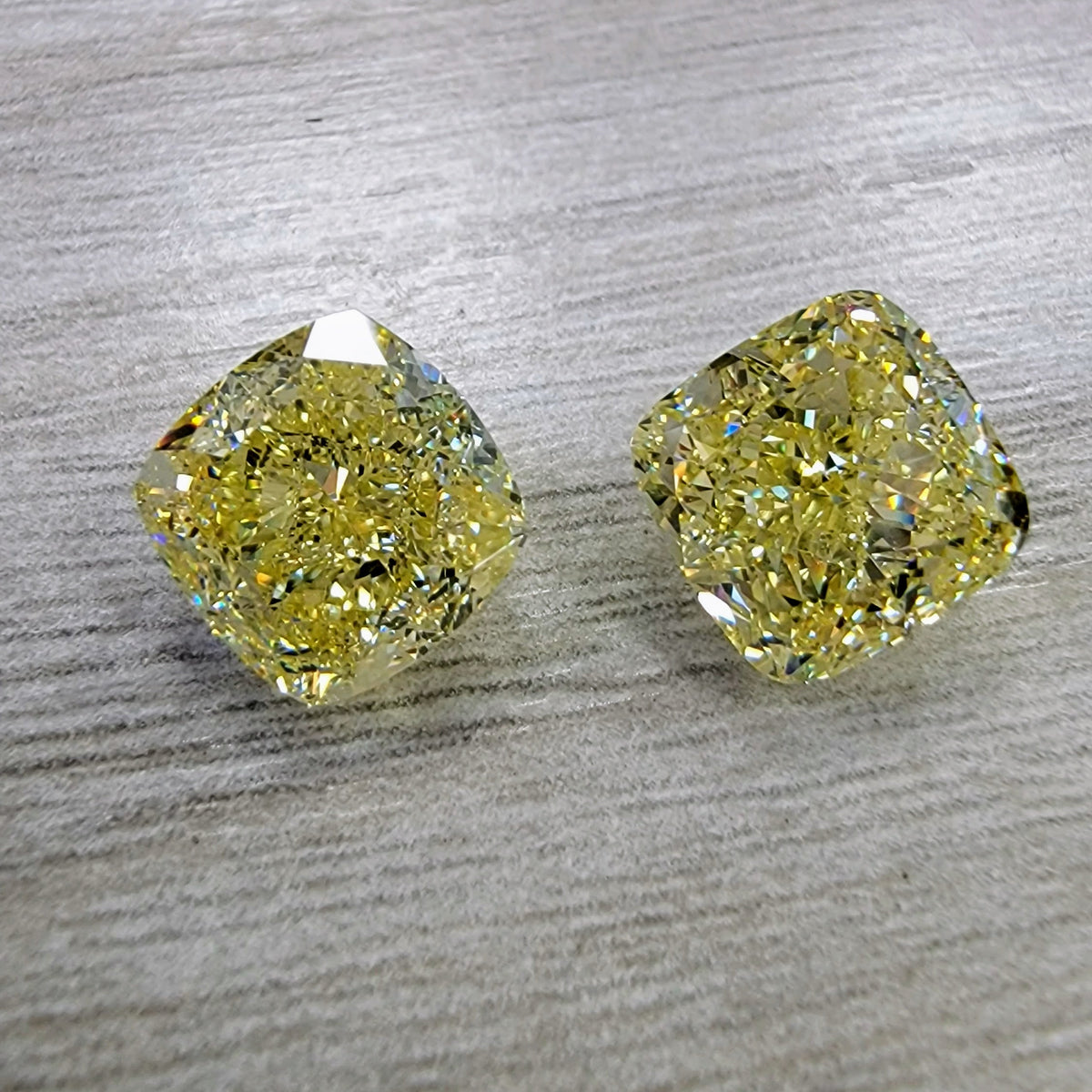 5.01ct & 5.02ct Fancy Yellow Cushion Diamonds GIA
