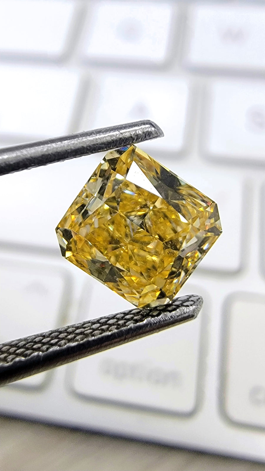 1.37ct Fancy Intense Orangy Yellow Radiant Diamond SI1 GIA