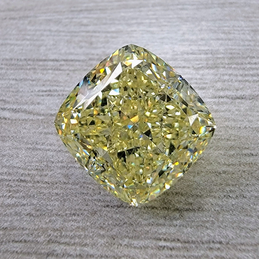 7.01ct Fancy Light Yellow Cushion Diamond VS1 GIA