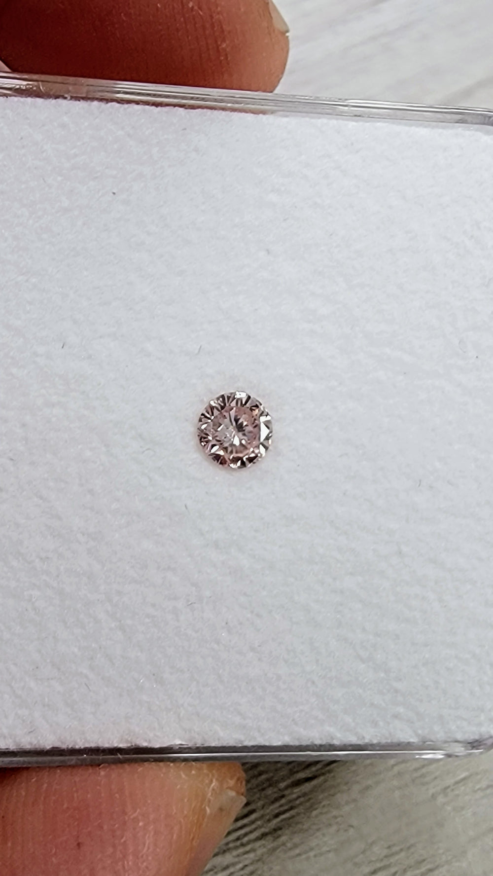 0.23ct Fancy Orangy Pink Round Diamond GIA