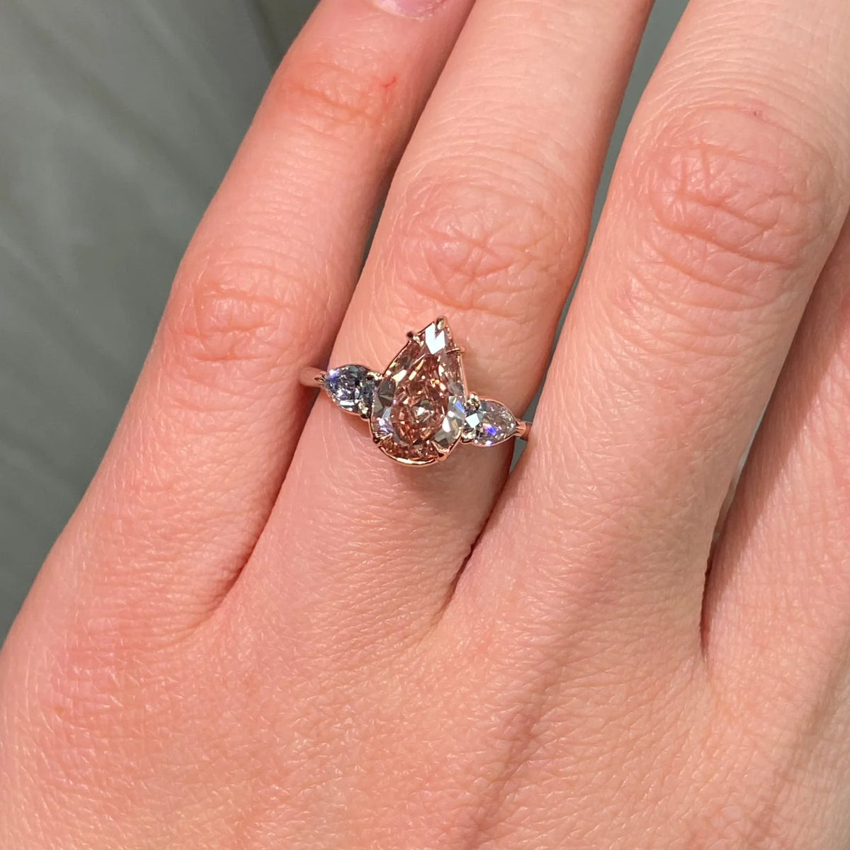 2.22ct Fancy Deep Brown-Pink Pear Diamond VS2 GIA Ring with Blue Diamond Sides