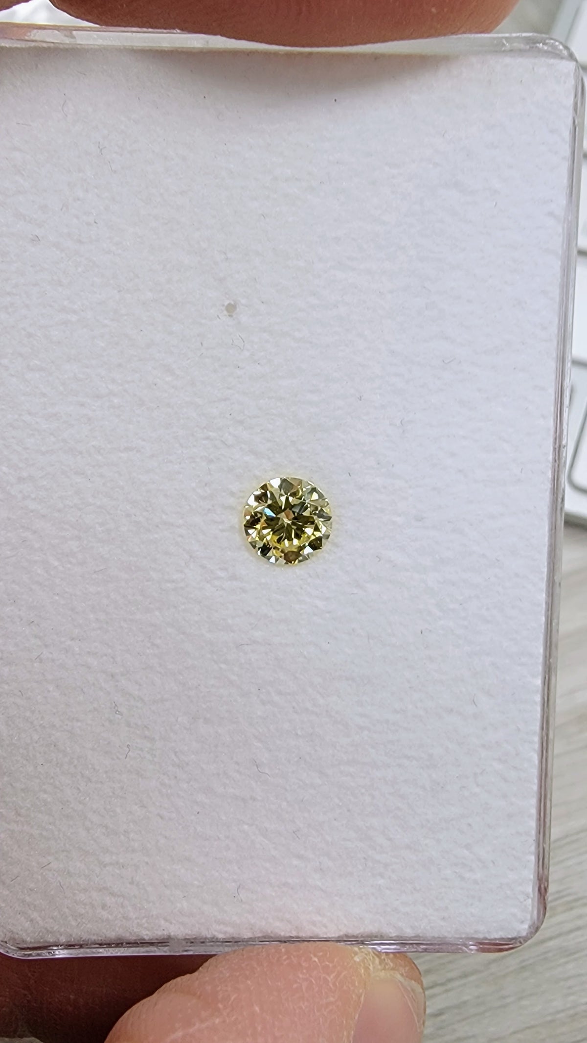 0.57ct Fancy Yellow Round Diamond VS1 GIA