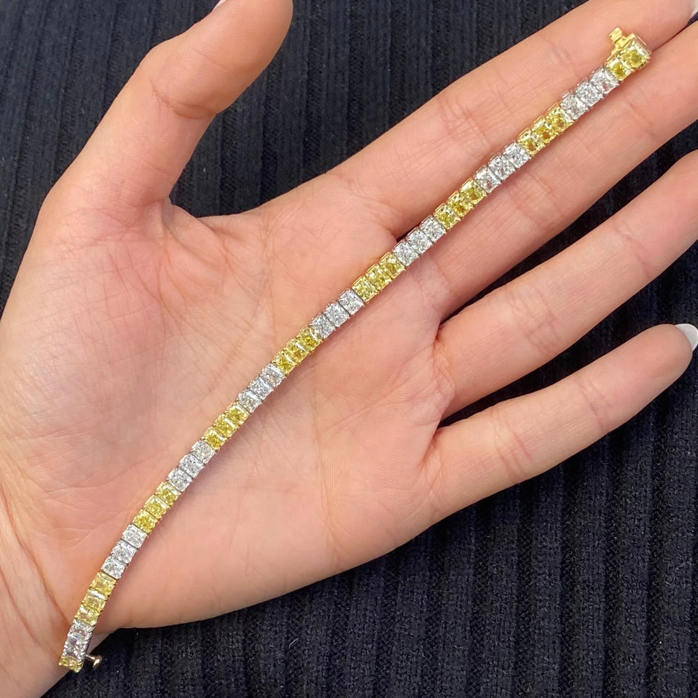 14.97ctw Fancy Intense Yellow Diamond and White Radiant Diamond Tennis Bracelet