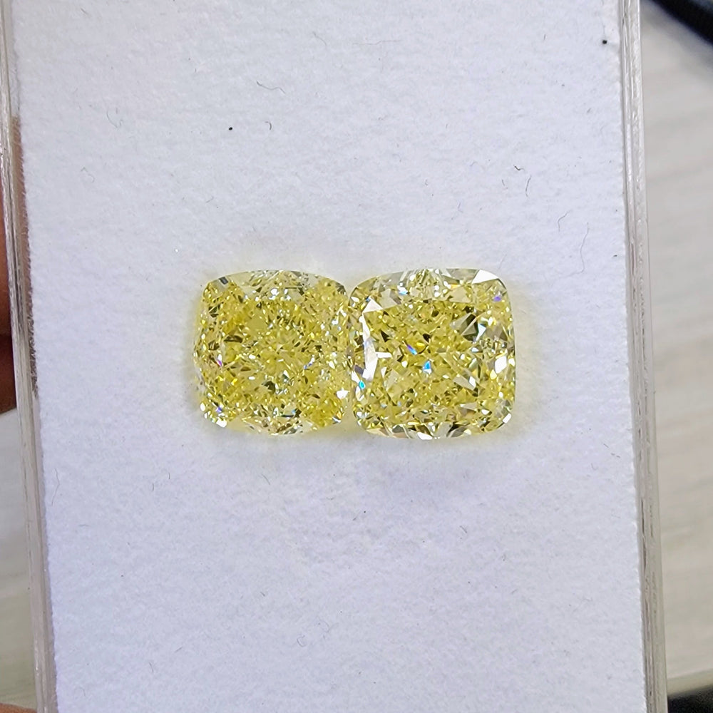 5.01ct & 5.02ct Fancy Yellow Cushion Diamonds GIA