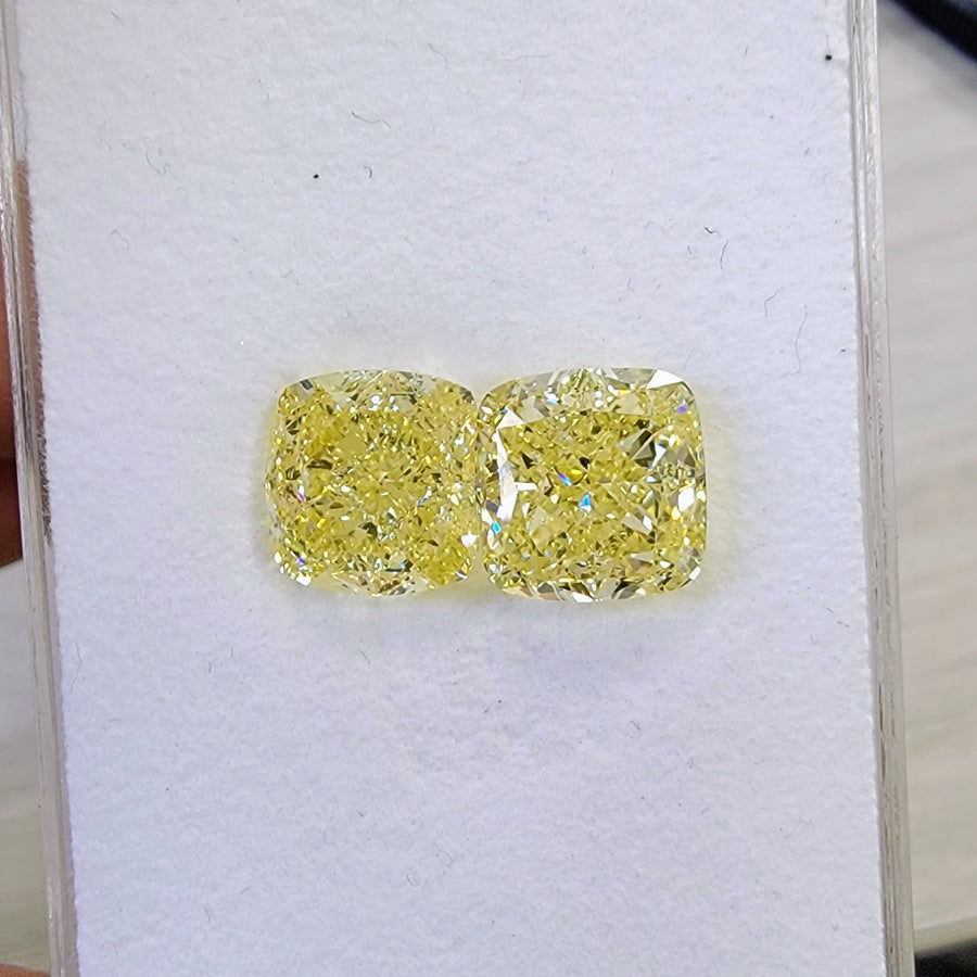 5.01ct & 5.02ct Fancy Yellow Cushion Diamonds GIA
