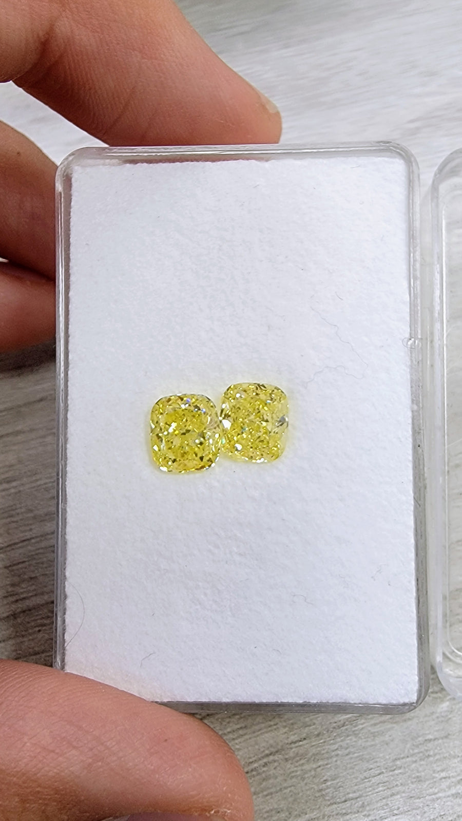 2.01ct & 2.00ct Fancy Intense Yellow Cushion Diamonds SI2 GIA