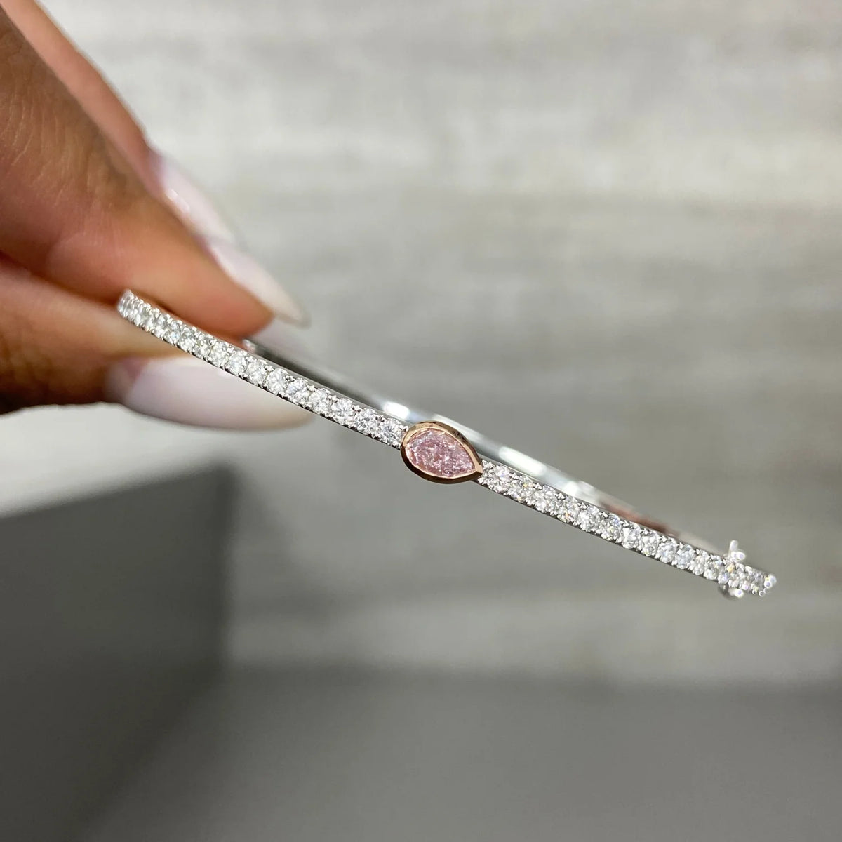0.25ct Fancy Light Pink Pear Diamond Bangle SI1 GIA
