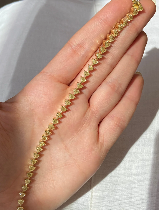 7.33ctw Fancy Yellow Heart Shape Diamond Tennis Bracelet | 18k