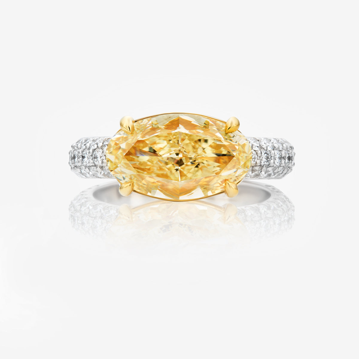 4.01ct Fancy Yellow Oval Diamond East West Ring VVS2 GIA
