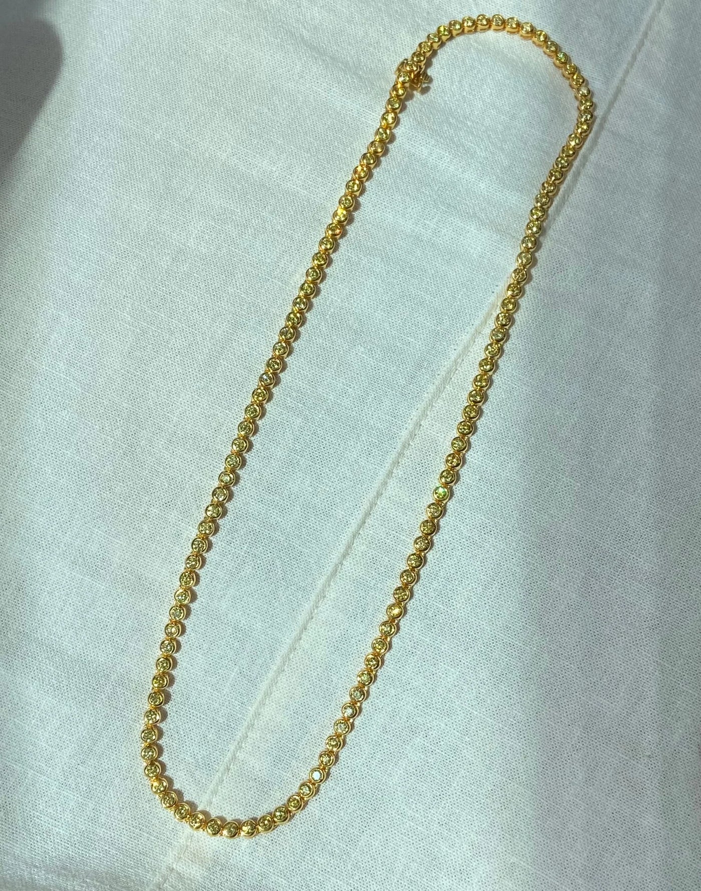 Fancy Intense Yellow Round Bezel Set Tennis Necklace