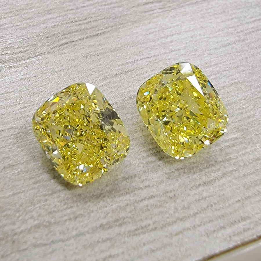 2.01ct & 2.00ct Fancy Intense Yellow Cushion Diamonds SI2 GIA