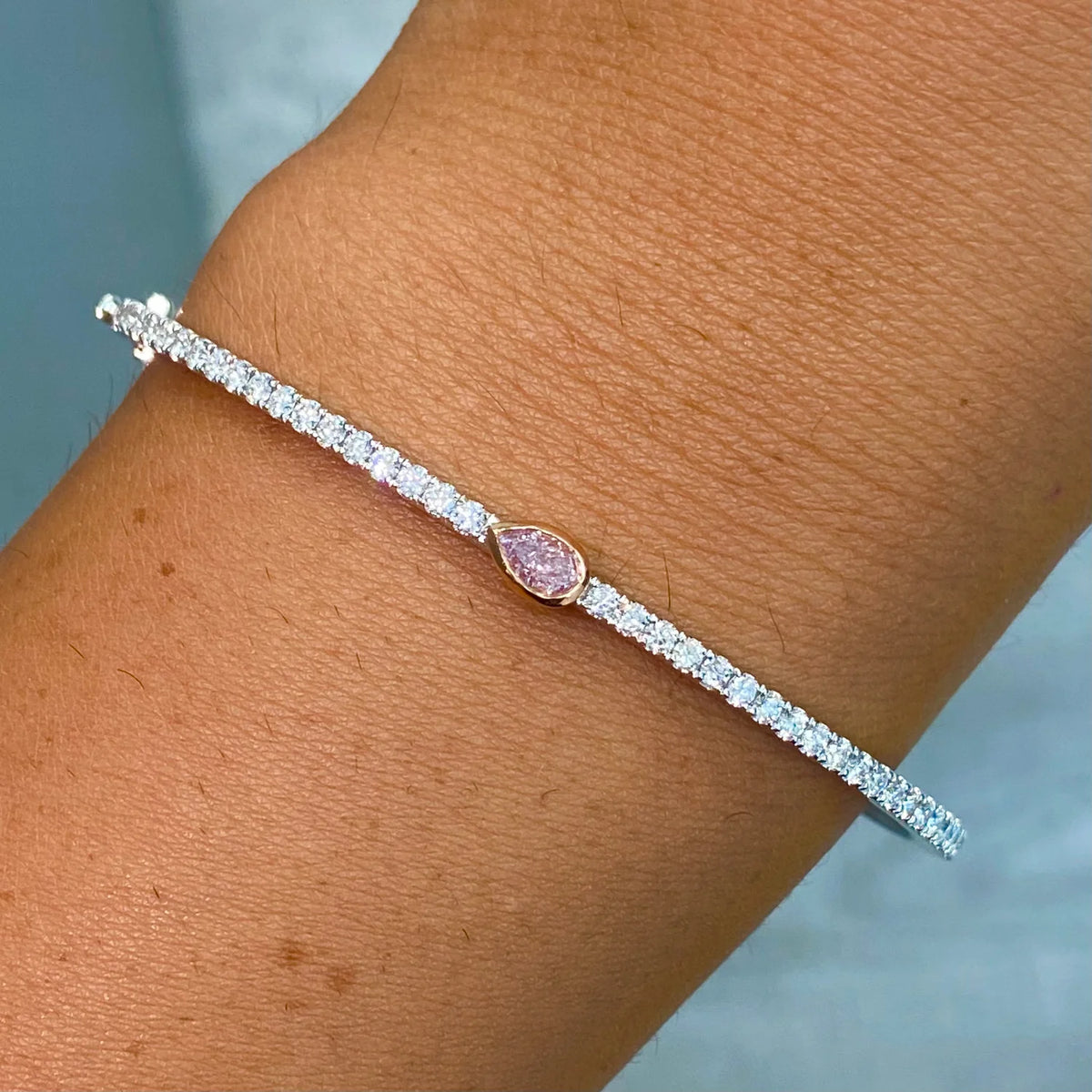 0.25ct Fancy Light Pink Pear Diamond Bangle SI1 GIA