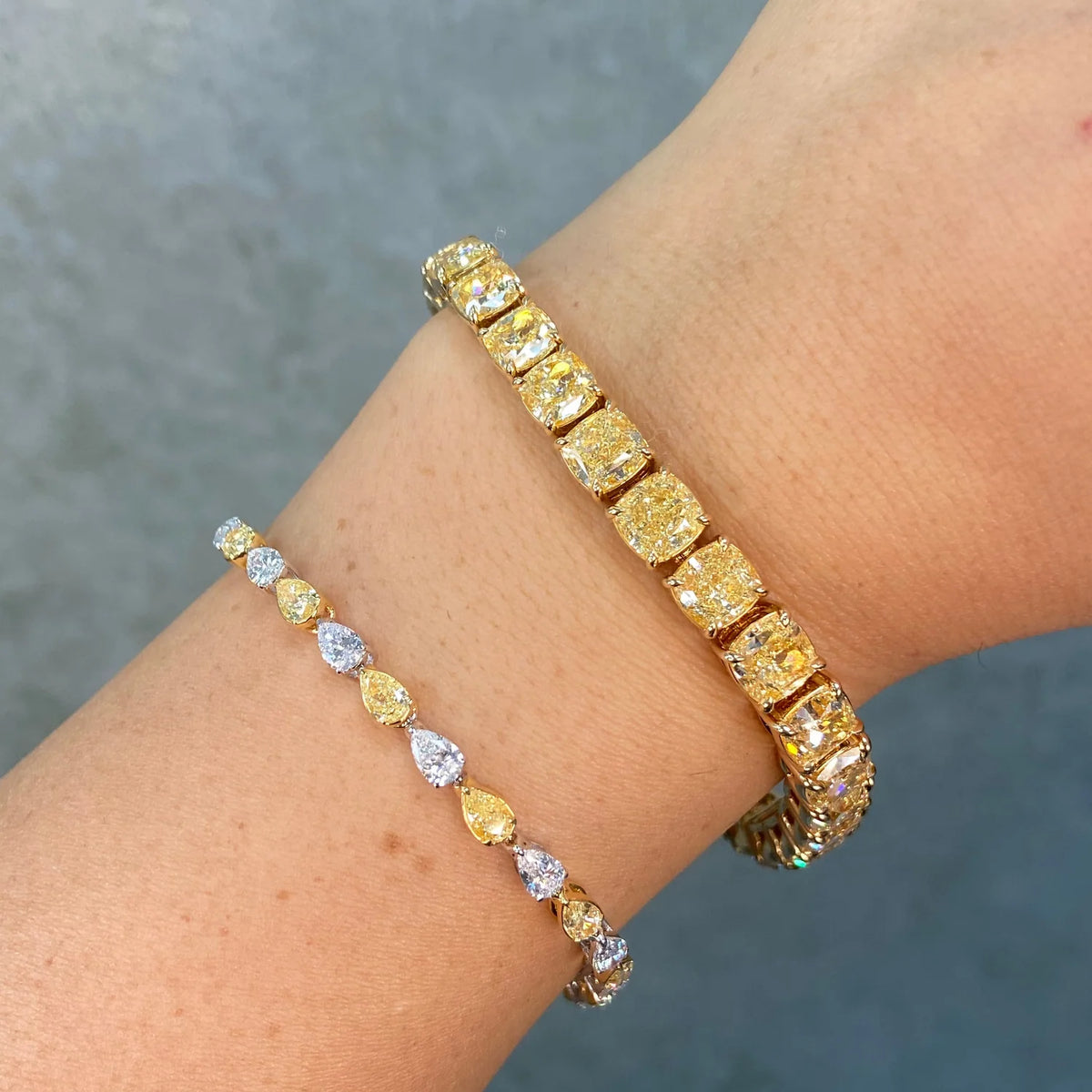 37.34ctw Fancy Light Yellow Cushion Diamond Tennis Bracelet GIA