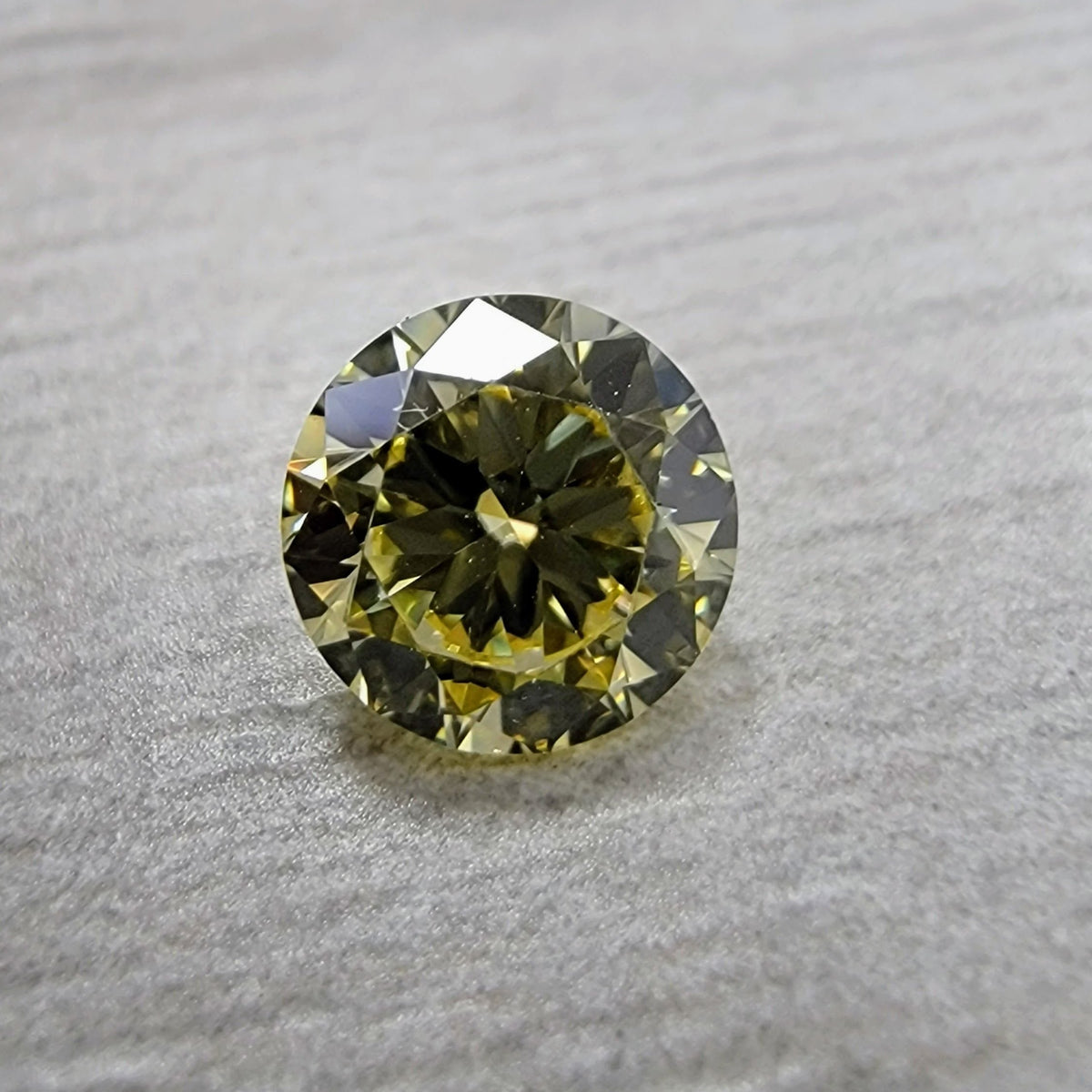 0.57ct Fancy Yellow Round Diamond VS1 GIA