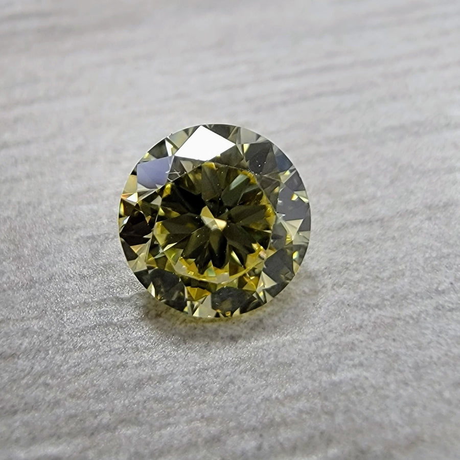 0.57ct Fancy Yellow Round Diamond VS1 GIA