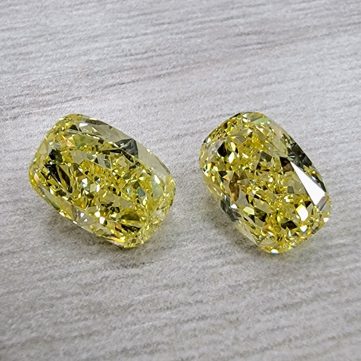 1.80ct & 1.84ct Fancy Intense Yellow Elongated Cushion Diamonds VS GIA