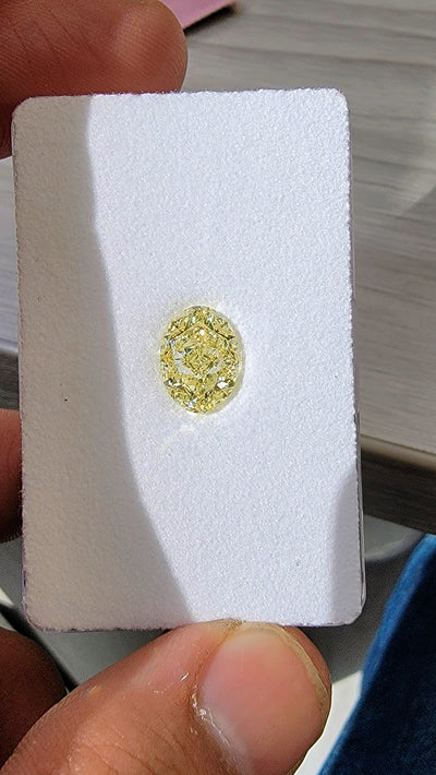 3.65ct Fancy Light Yellow Oval VS1 GIA