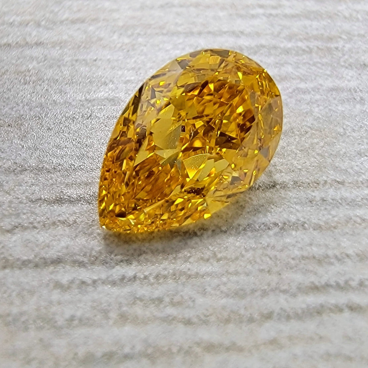 0.50ct Fancy Vivid Yellow Orange Pear Diamond SI1 GIA