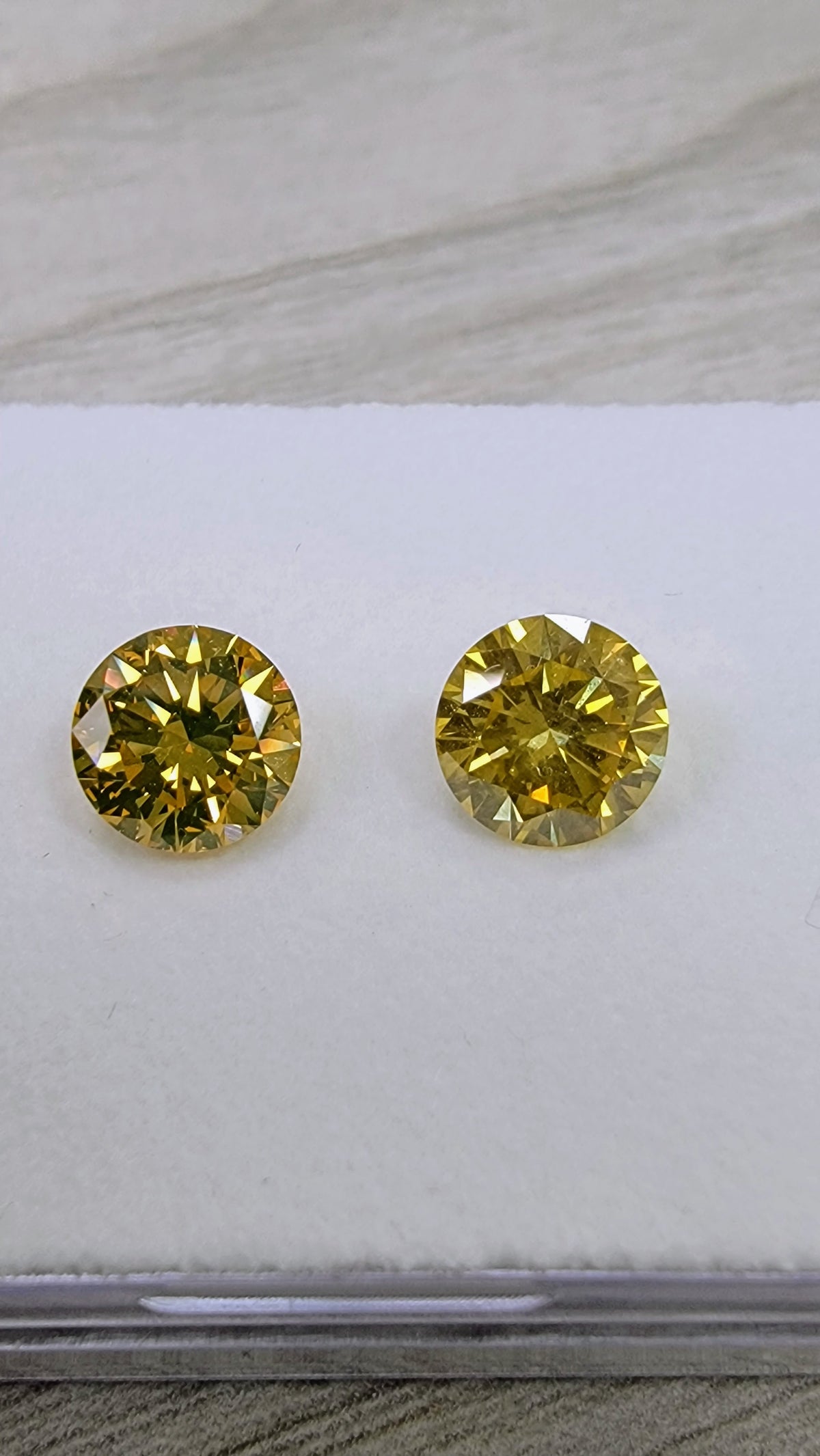 1.56ct & 1.57ct Fancy Deep Yellow Round Diamonds VVS2 / I1 GIA