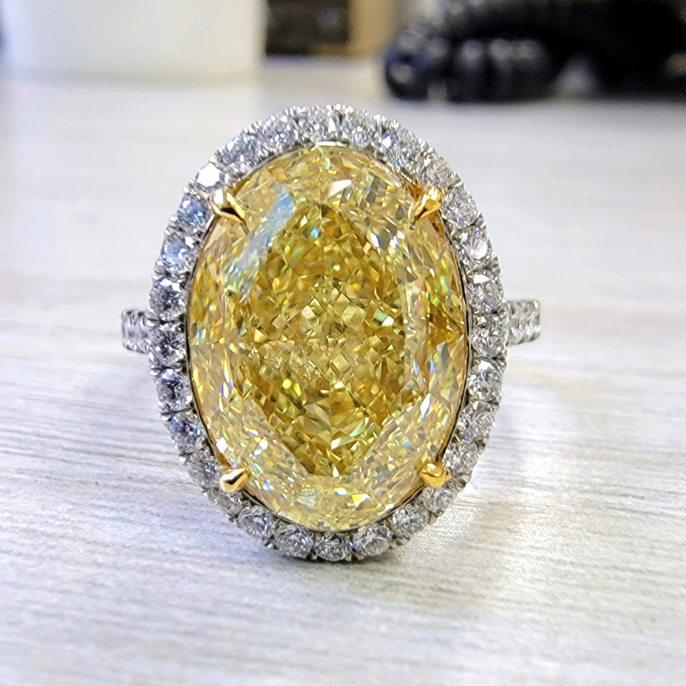 6.16ct Fancy Light Yellow Oval Diamond Ring VS1 GIA