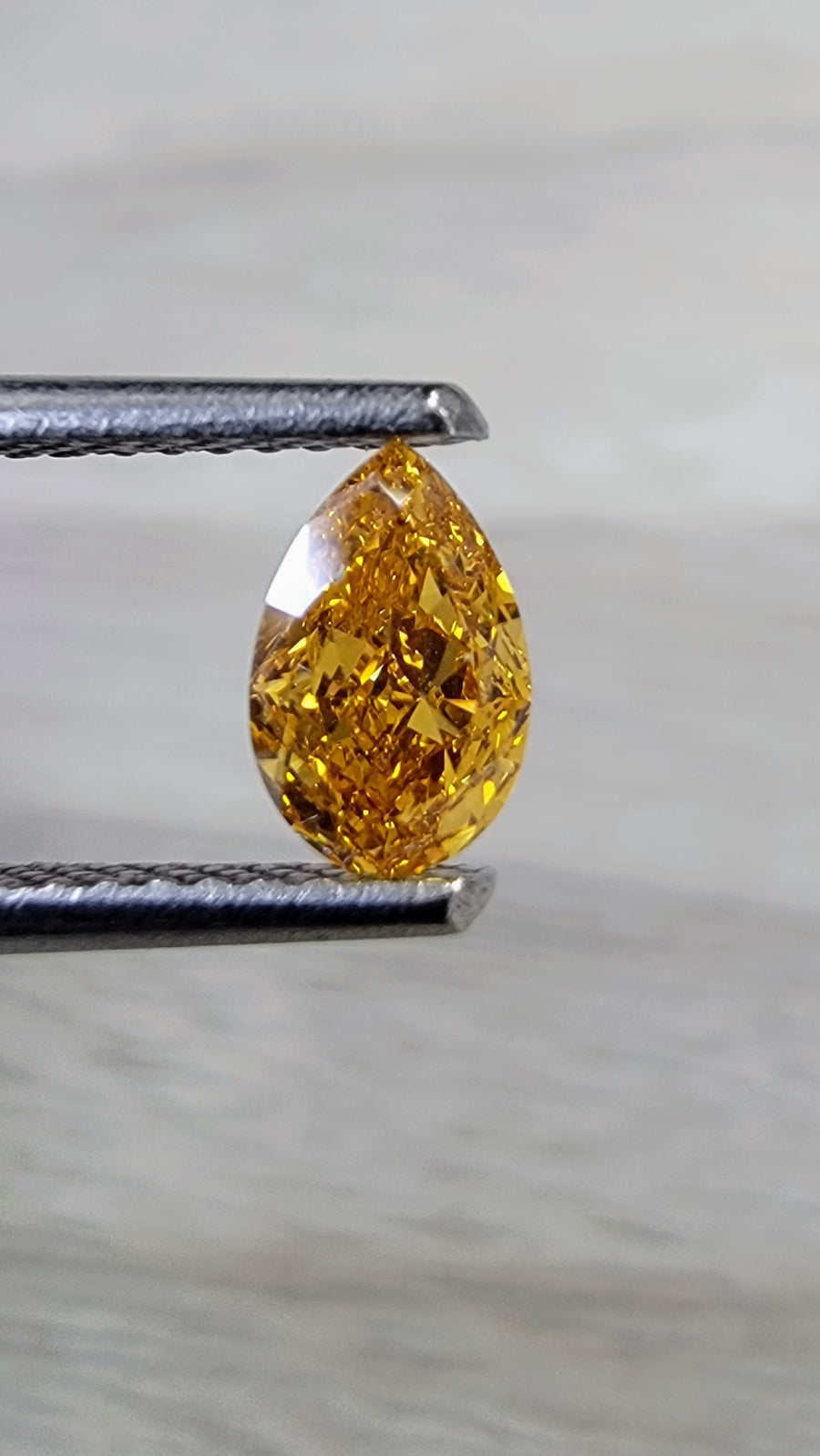 0.50ct Fancy Vivid Yellow Orange Pear Diamond SI1 GIA