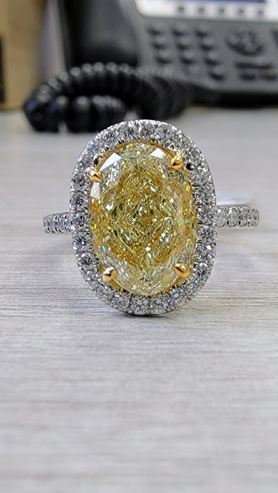 3.21ct Light Yellow Oval VS1 GIA Ring