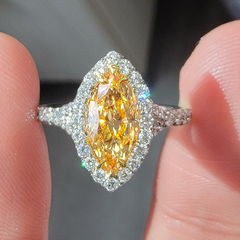 1.05ct Fancy Intense Orange-Yellow Marquise Diamond Ring VVS1
