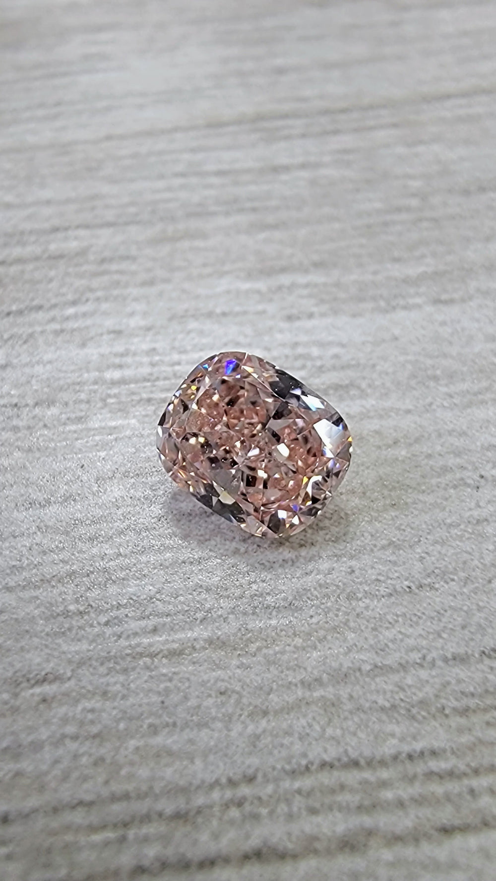 0.53ct Fancy Orangy Pink Cushion Diamond VS1 GIA