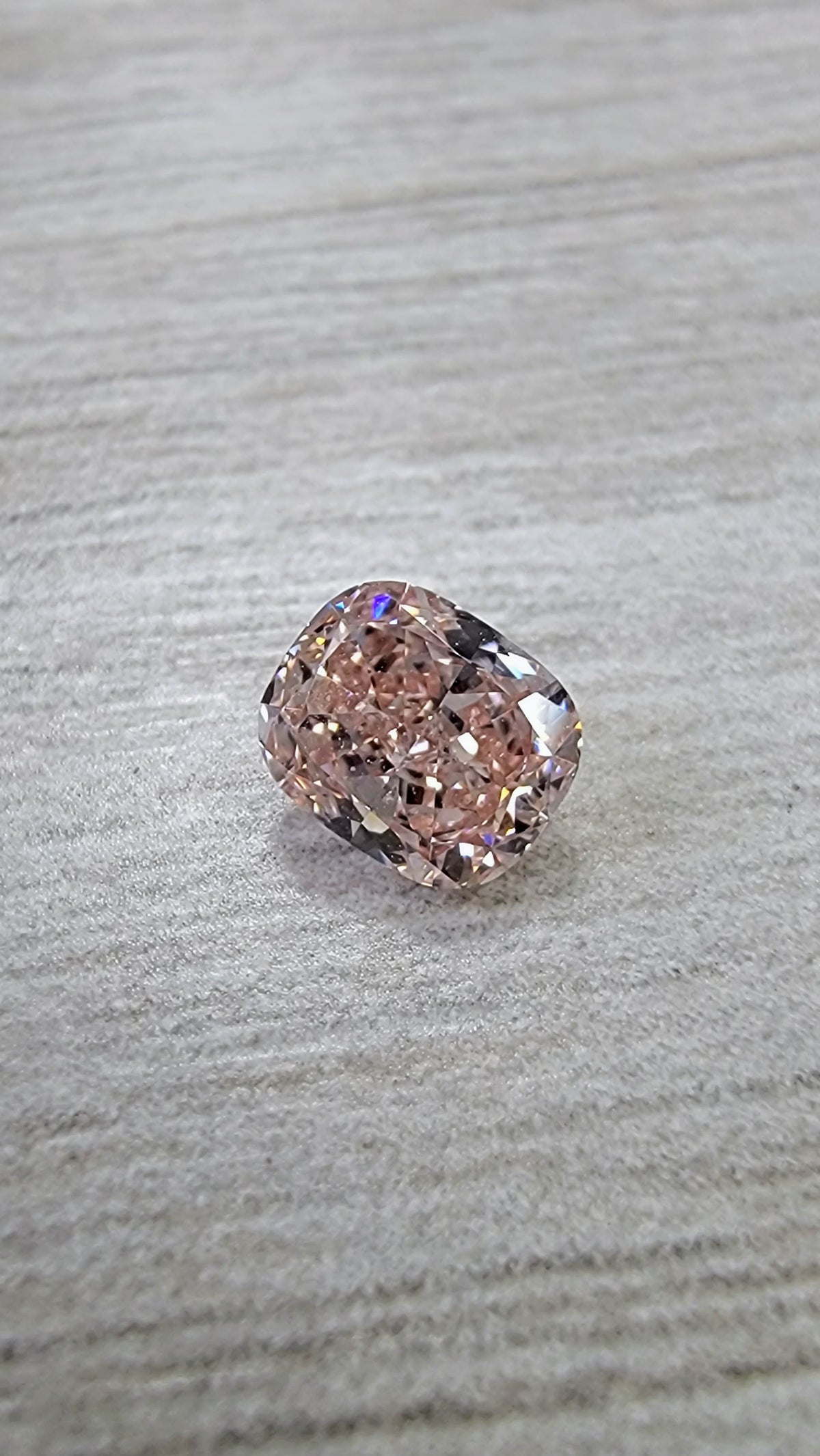 0.53ct Fancy Orangy Pink Cushion Diamond VS1 GIA