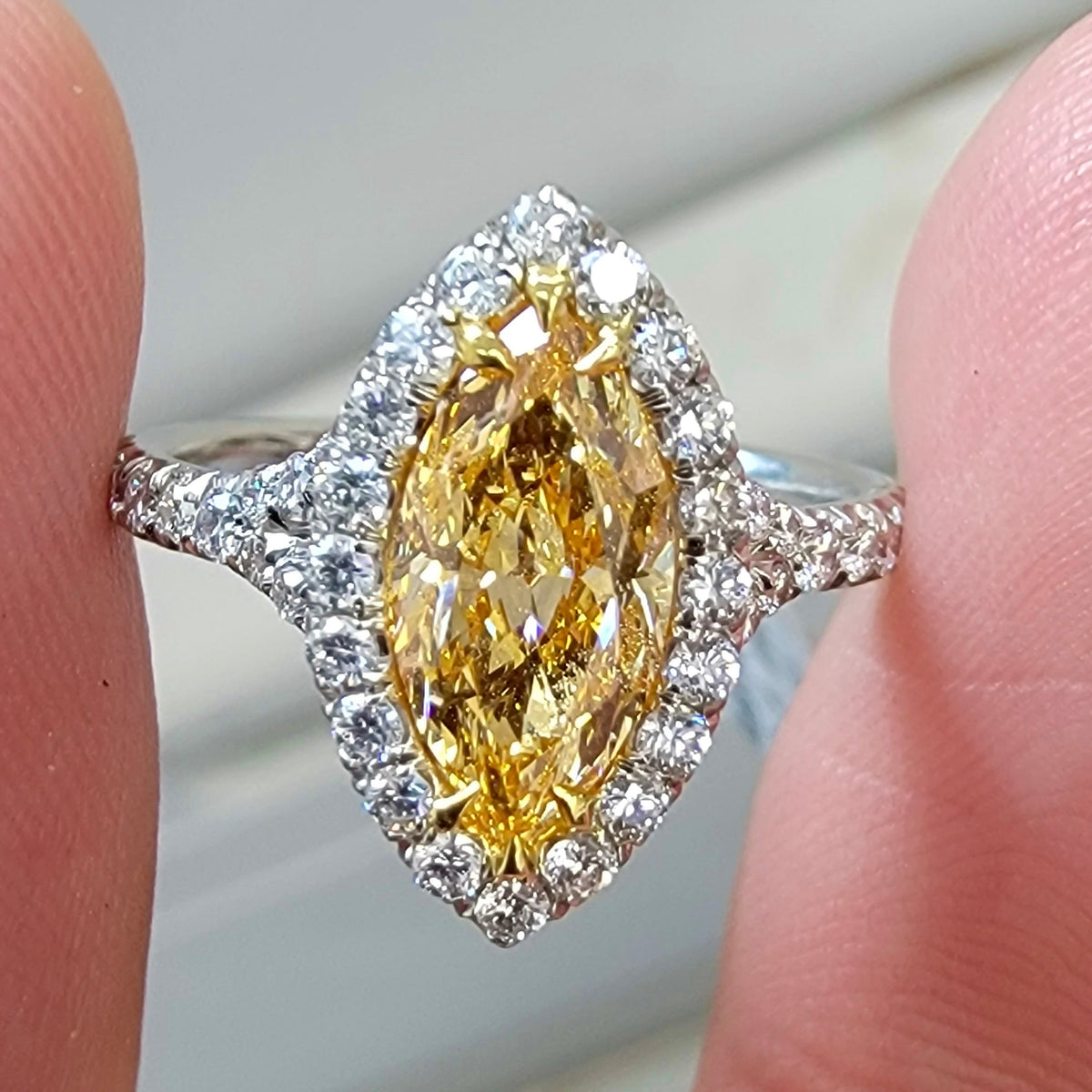 1.05ct Fancy Intense Orange-Yellow Marquise Diamond Ring VVS1