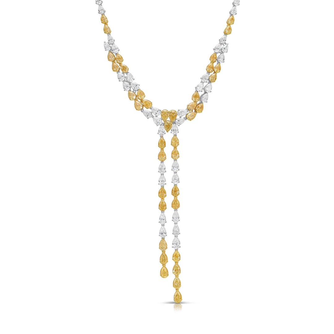 Luxurious double lariat necklace featuring 28.48 carats of natural fancy yellow and white diamonds in 18kt gold, shown on a white background.