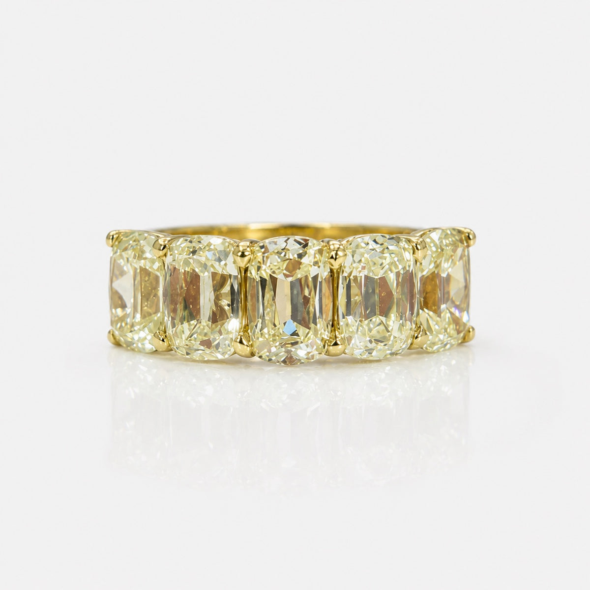 5.11ctw Fancy Light Yellow Old Mine Oval Diamond 5-Stone Ring