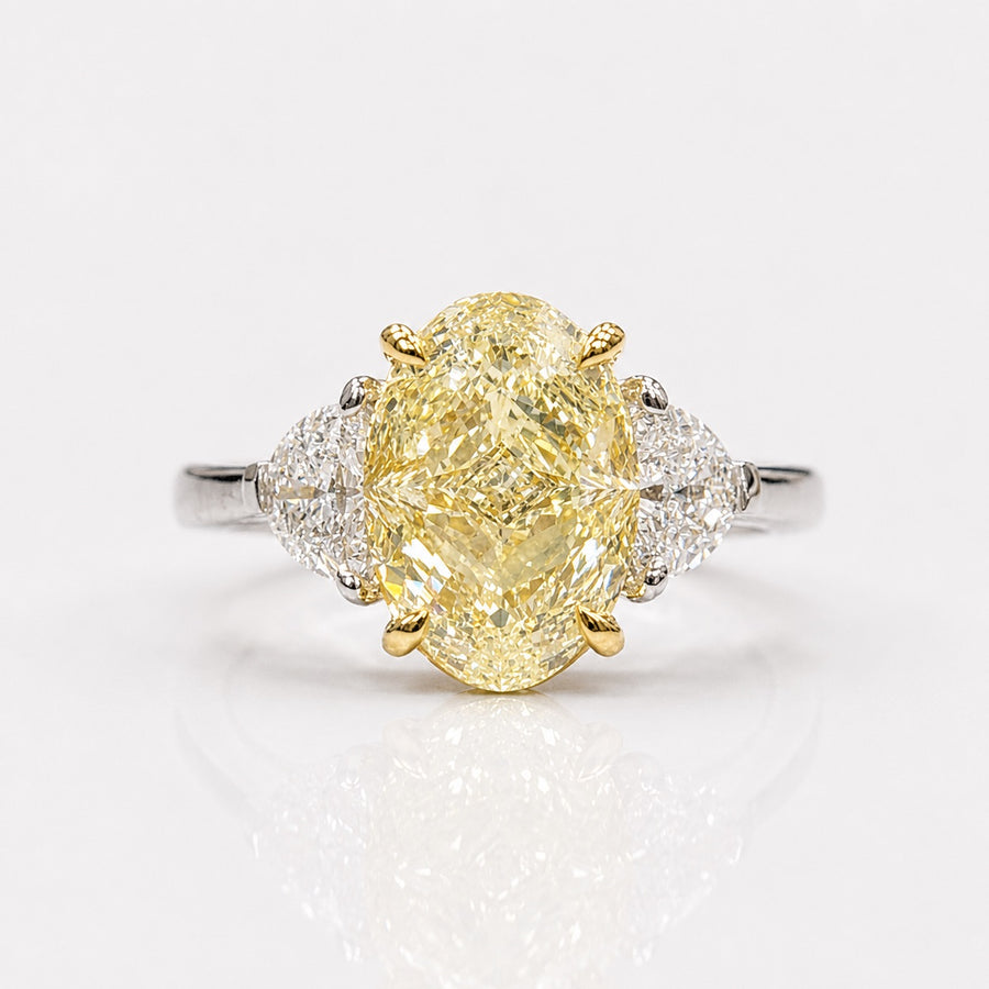 4.30ct Light Yellow Oval Diamond Ring VS1 GIA