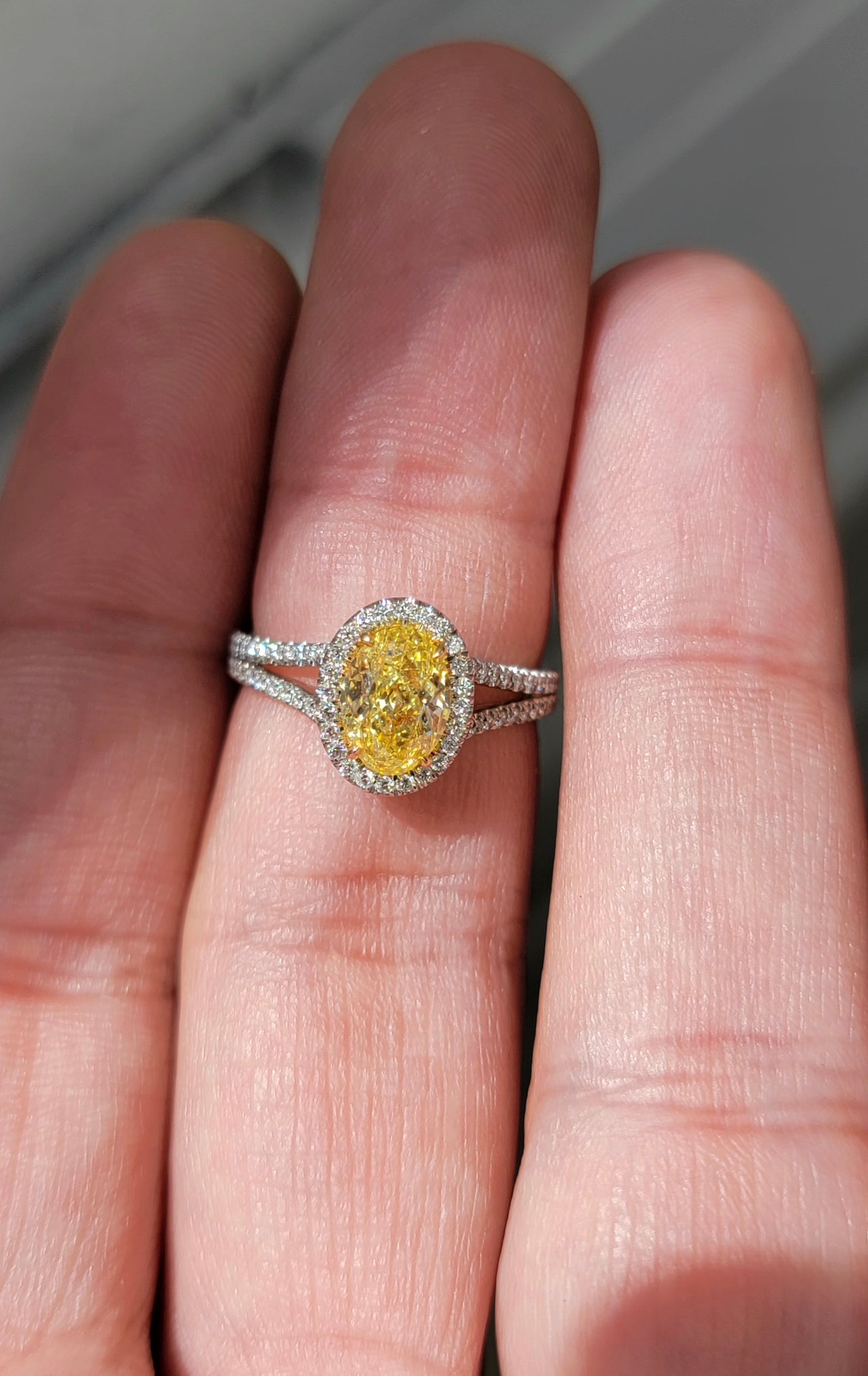 1.47ct Fancy Intense Yellow Oval SI1 GIA Ring