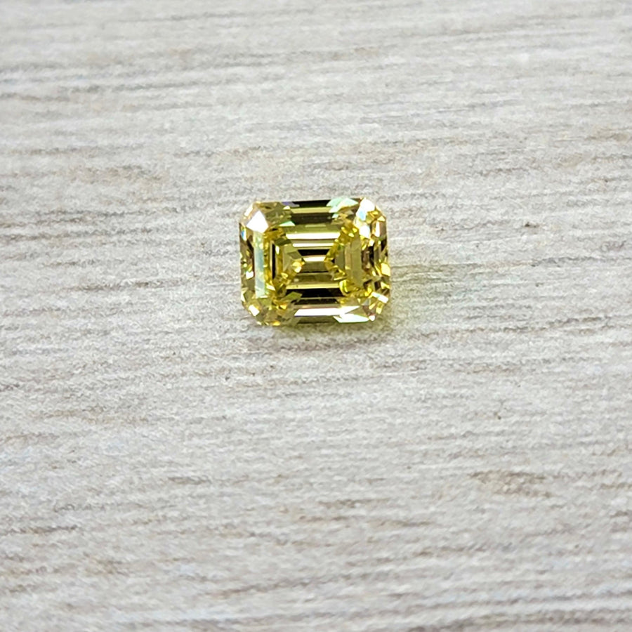 0.71ct Fancy Intense Yellow Emerald-Cut Diamond VS2 GIA