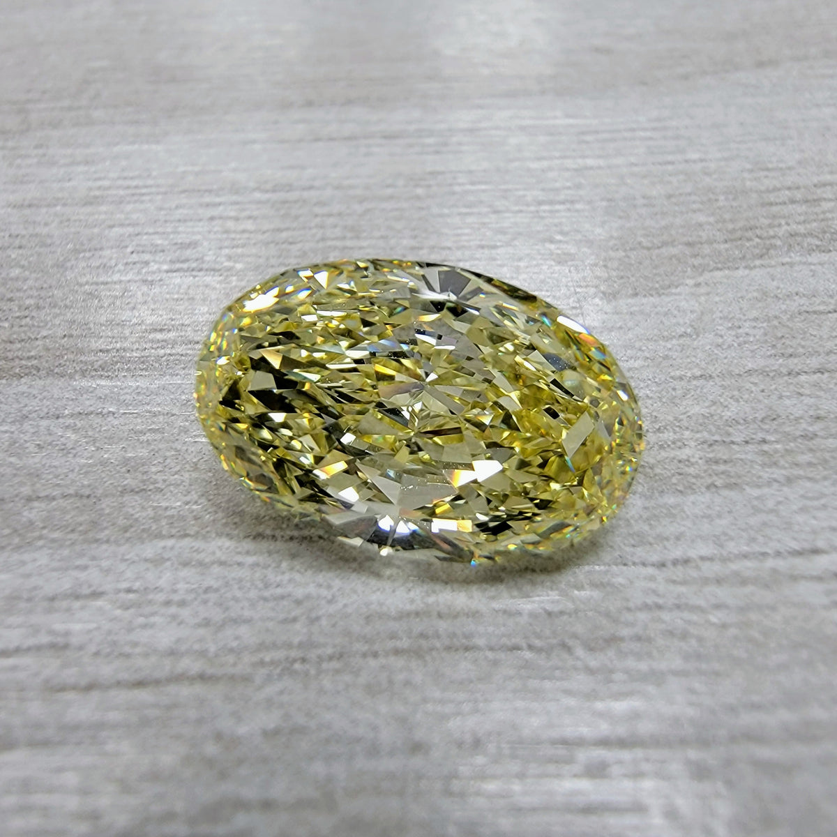 5.60ct Fancy Yellow Oval Diamond VVS2 GIA