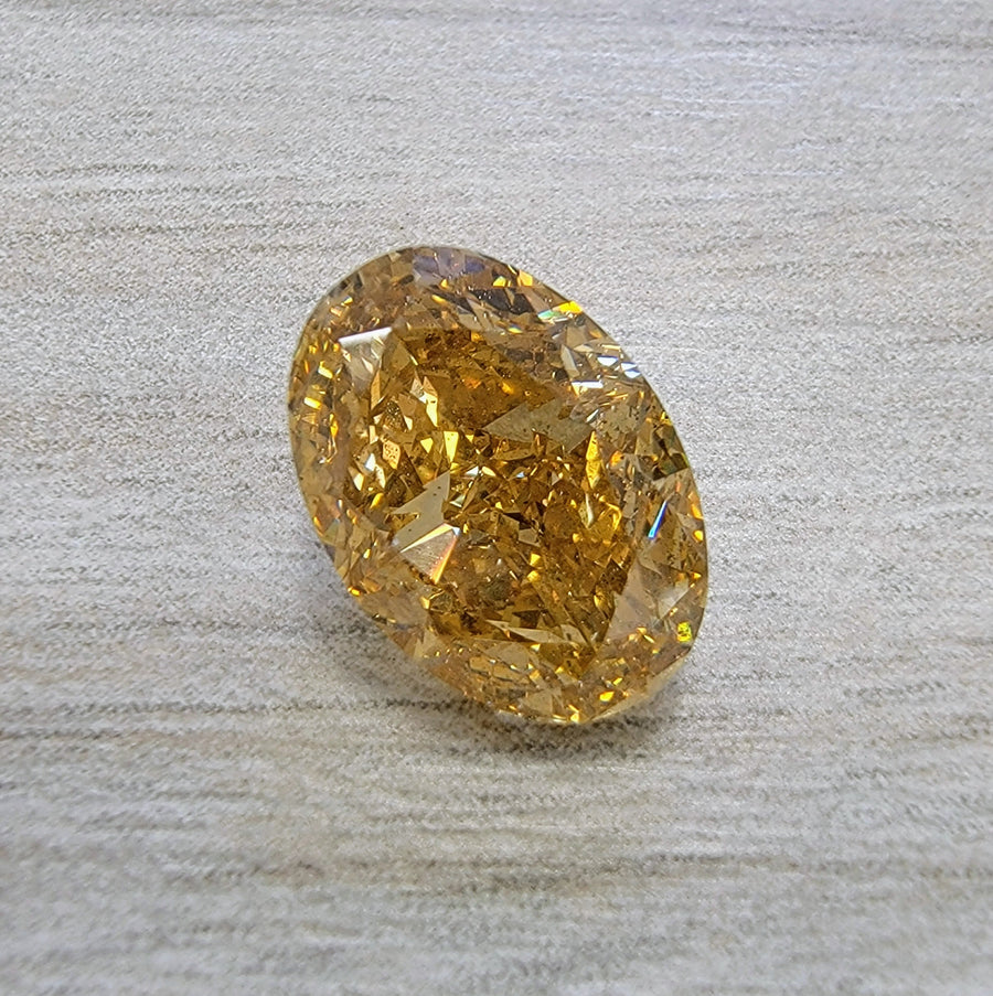 5.02ct Fancy Dark Brownish Orangy Yellow Oval Diamond GIA